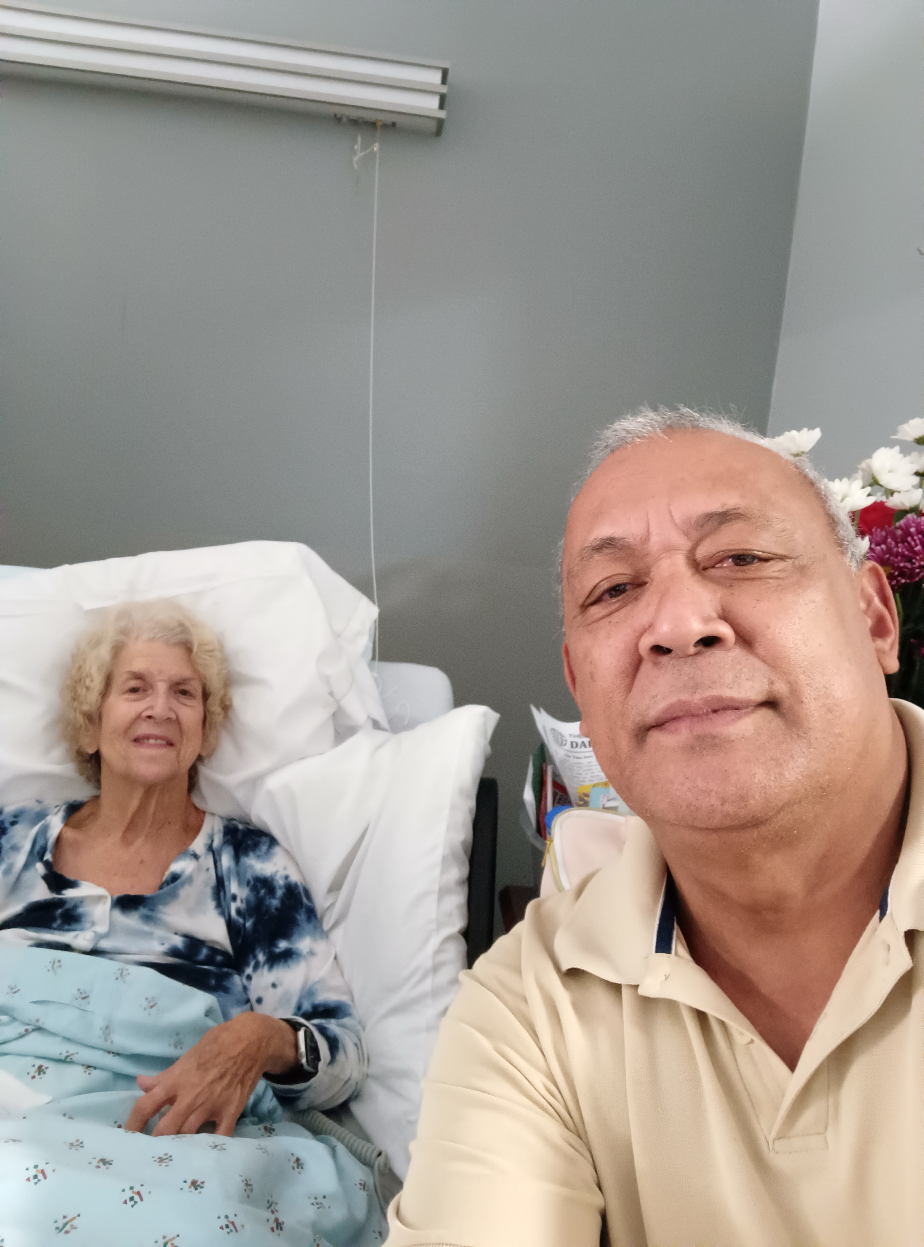Tim visiting a client in the hospital