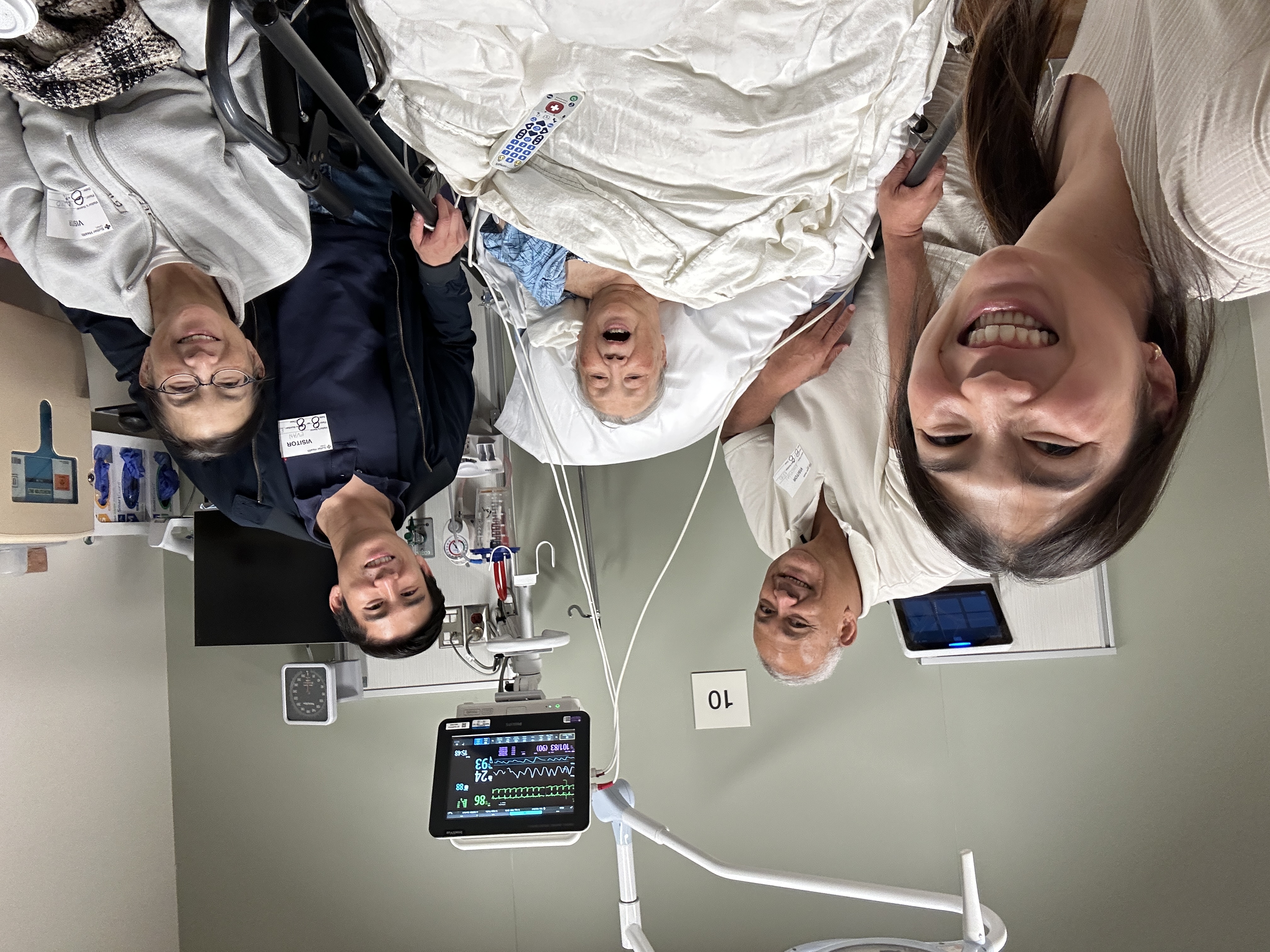 Tim and family visiting during a hospital overnight stay